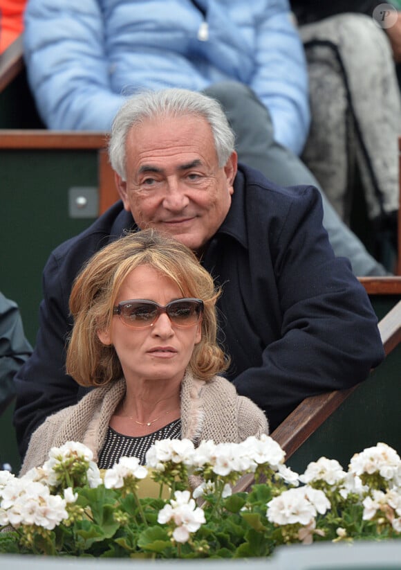 Dominique Strauss-Kahn et Myriam L'Aouffir - People assistent au 8 eme sacre de Rafael Nadal lors des Internationaux de France a Roland Garros a Paris le 9 juin 2013.