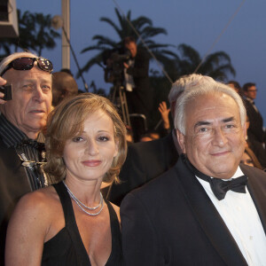 Dominique Strauss Kahn et Myriam L'Aouffir sur le tapis rouge lors du 66eme festival du film de Cannes. Le 25 mai 2013.