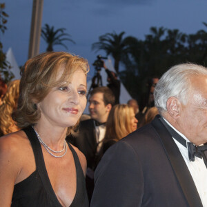 Dominique Strauss Kahn et Myriam L'Aouffir sur le tapis rouge lors du 66eme festival du film de Cannes. Le 25 mai 2013.