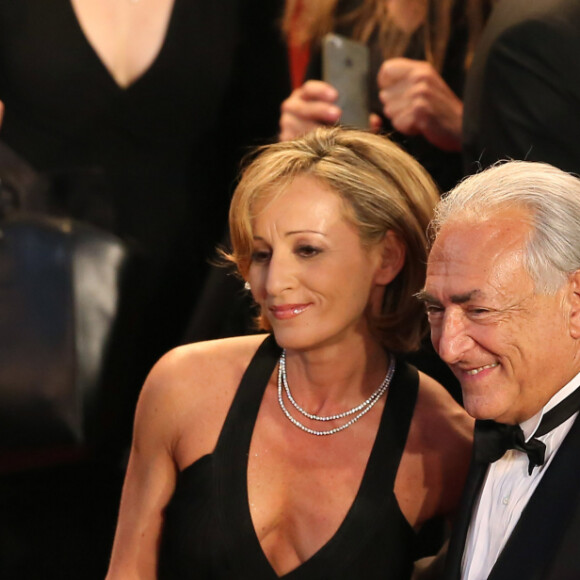 Dominique Strauss Kahn et Myriam L'Aouffir sur le tapis rouge lors du 66eme festival du film de Cannes. Le 25 mai 2013.