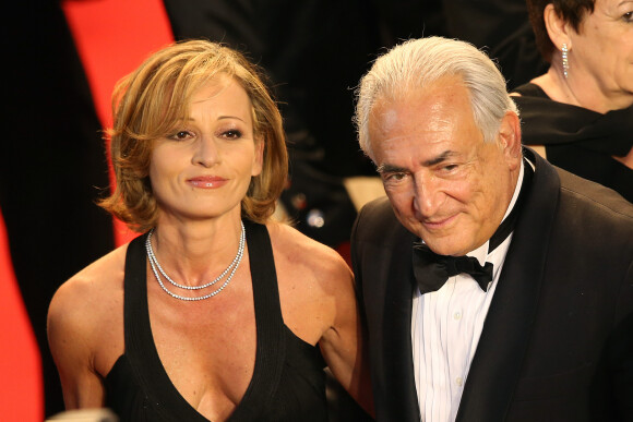 Dominique Strauss Kahn et Myriam L'Aouffir sur le tapis rouge lors du 66eme festival du film de Cannes. Le 25 mai 2013.