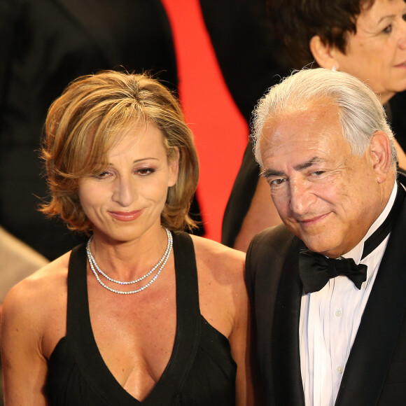 Dominique Strauss Kahn et Myriam L'Aouffir sur le tapis rouge lors du 66eme festival du film de Cannes. Le 25 mai 2013.