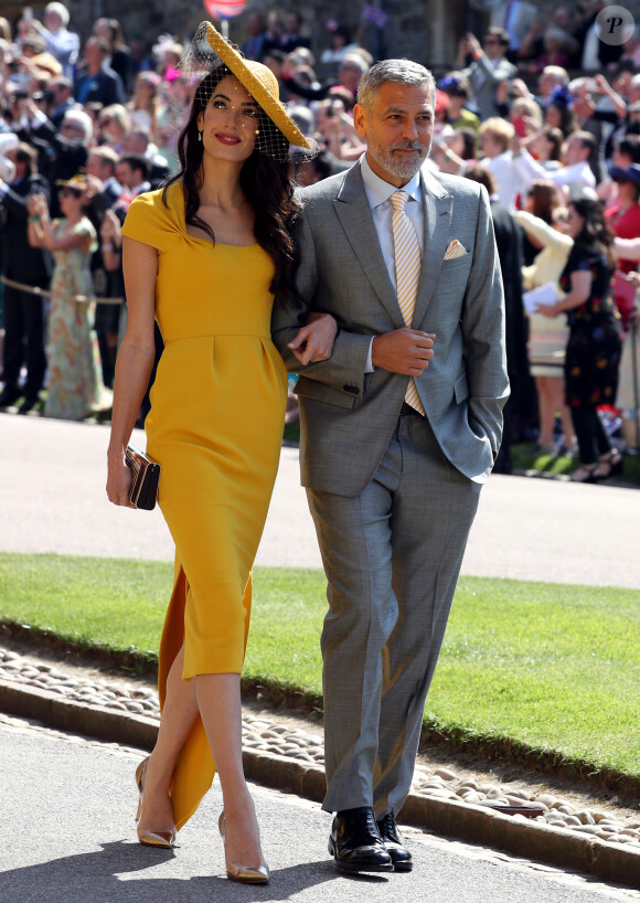 George Clooney et sa femme Amal - Les invités arrivent à la chapelle St. George pour le mariage du prince Harry et de Meghan Markle au château de Windsor, Royaume Uni, le 19 mai 2018.