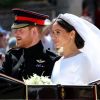 Le prince Harry, duc de Sussex, et Meghan Markle, duchesse de Sussex, en calèche au château de Windsor après la cérémonie de leur mariage au château de Windsor, Royaume Uni, le 19 mai 2018.