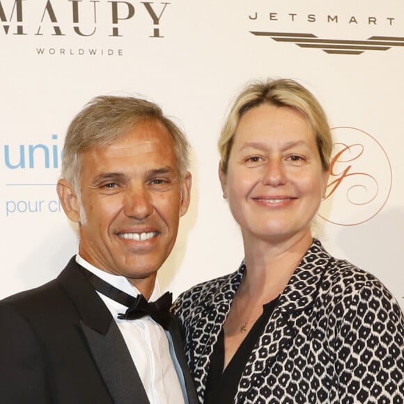 Paul Belmondo et sa femme Luana Belmondo au photocall de la 9ème édition du "Global Gift Gala" à l'hôtel Four Seasons George V à Paris, le 25 avril 2018. © Marc Ausset-Lacroix/Bestimage