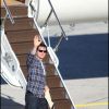 Tom Cruise sort de l'avion qui l'a conduit à Salzbourg pour le tournage du film "Night and day". Le 19 novembre 2009.