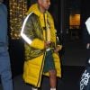 Pharrell Williams et sa femme H. Lasichanh porte les mêmes baskets Human Made Adidas en balade dans les rues de New York, le 4 décembre 2019.