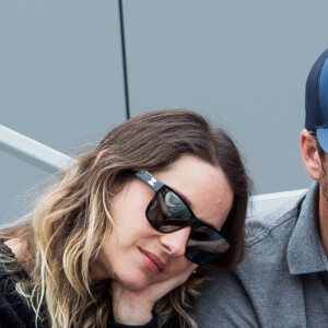 Marion Cotillard et son compagnon Guillaume Canet - People dans les tribunes lors de la finale messieurs des internationaux de France de tennis de Roland Garros 2019 à Paris le 9 juin 2019. © Jacovides-Moreau/Bestimage