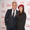 David Ginola et sa compagne Maeva Denat arrivent à la soirée "The Beating Hearts Ball" à Londres, le 27 février 2019.