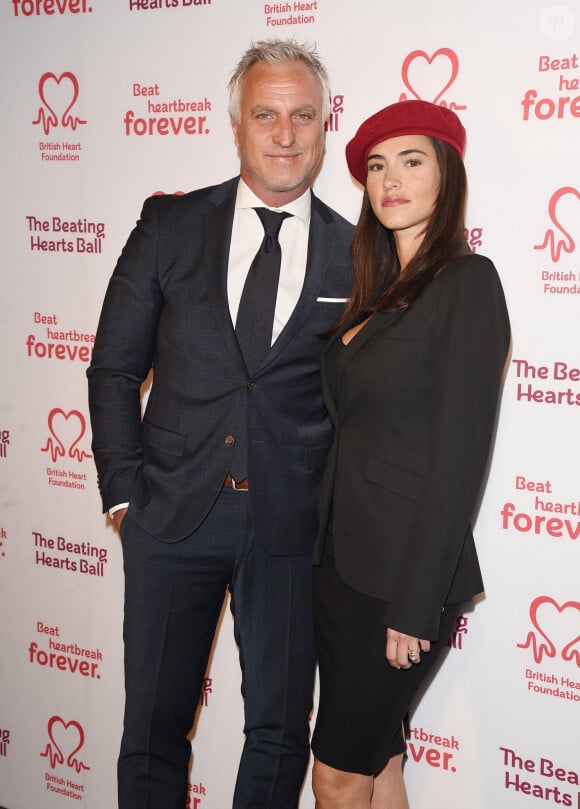 David Ginola et sa compagne Maeva Denat arrivent à la soirée "The Beating Hearts Ball" à Londres, le 27 février 2019.