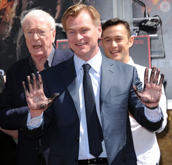 <p>Christopher Nolan, Michael Caine et Joseph Gordon-Levitt - Christopher Nolan dévoile sa plaque sur Hollywood Boulevard. Los Angeles. Le 7 juillet 2012.</p>