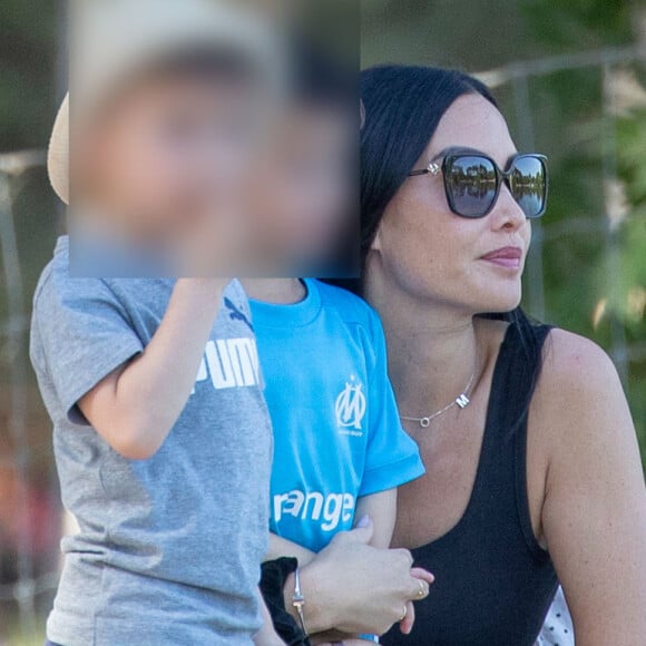 Exclusif - Adil Rami de sortie dans le bois de Boulogne avec son ex-compagne Sidonie Biémont et de leurs deux enfants Zayn et Madi. Le 30 mai 2020.