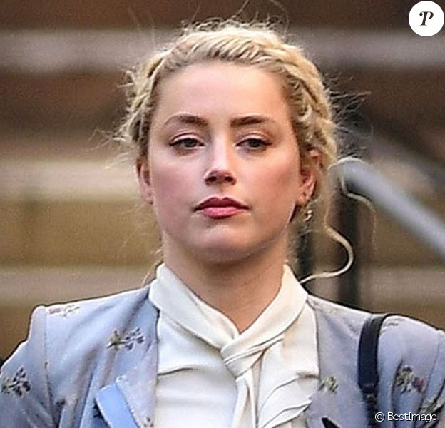 Amber Heard - J. Depp et A. Heard sortent de la cour royale de justice à Londres, pour le procès en diffamation contre le magazine The Sun Newspaper. Le 21 juillet 2020.