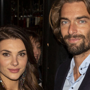 Camille Lacourt et sa compagne Alice Detollenaere (Miss Bourgogne 2010) lors de la soirée de lancement de la vodka "Touché" (vodka parisienne) au restaurant Castel à Paris, France, le 26 septembre 2019. © Jack Tribeca/Bestimage