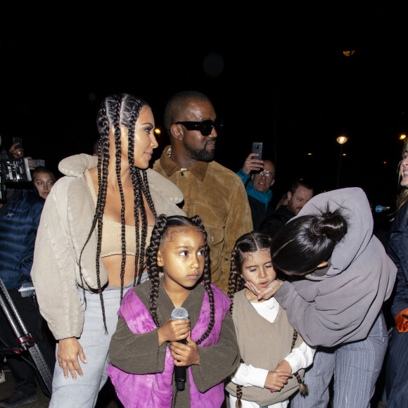 Exclusif - Kanye West, Kim Kardashian, North West, Kourtney Kardashian, Penelope Disick - K.West présente sa 8ème collection Yeezy au siège du Parti Communiste à Paris le 2 mars 2020.