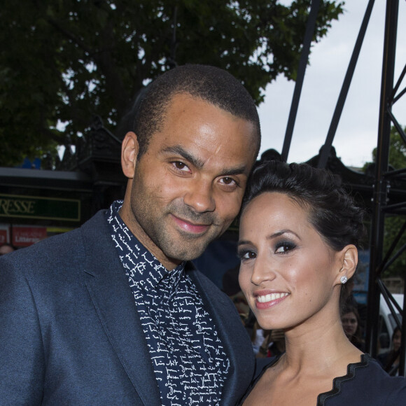 Tony Parker et Axelle Francine - Première du film "Jurassic World" à l'Ugc Normandie à Paris le 29 mai 2015.