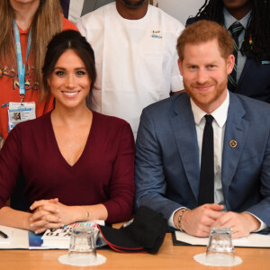 Le prince Harry, duc de Sussex, et Meghan Markle, duchesse de Sussex, participent à une réunion sur l'égalité des genres avec les membres du Queen's Commonwealth Trust (dont elle est vice-présidente) et du sommet One Young World au château de Windsor, 2019.