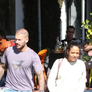 Matt Pokora et sa compagne Christina Milian se baladent avec leur fils Isaiah dans le quartier de West Hollywood à Los Angeles. La petite famille est allée déjeuner chez Fred Segal. Le 11 février 2020