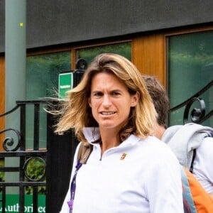 Exclusif - Amélie Mauresmo et Lucas Pouille à la sortie de leur entrainement lors du tournoi de tennis de Wimbledon à Londres. Le 26 juin 2019 