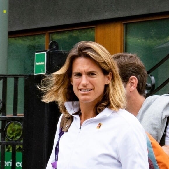 Exclusif - Amélie Mauresmo et Lucas Pouille à la sortie de leur entrainement lors du tournoi de tennis de Wimbledon à Londres. Le 26 juin 2019