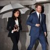 Le prince Harry et Meghan Markle (en tailleur Alexander McQueen) arrivent à pied sous la pluie à la soirée " Endeavour Fund Awards" au Goldsmith Hall à Londres le 1er février 2018.