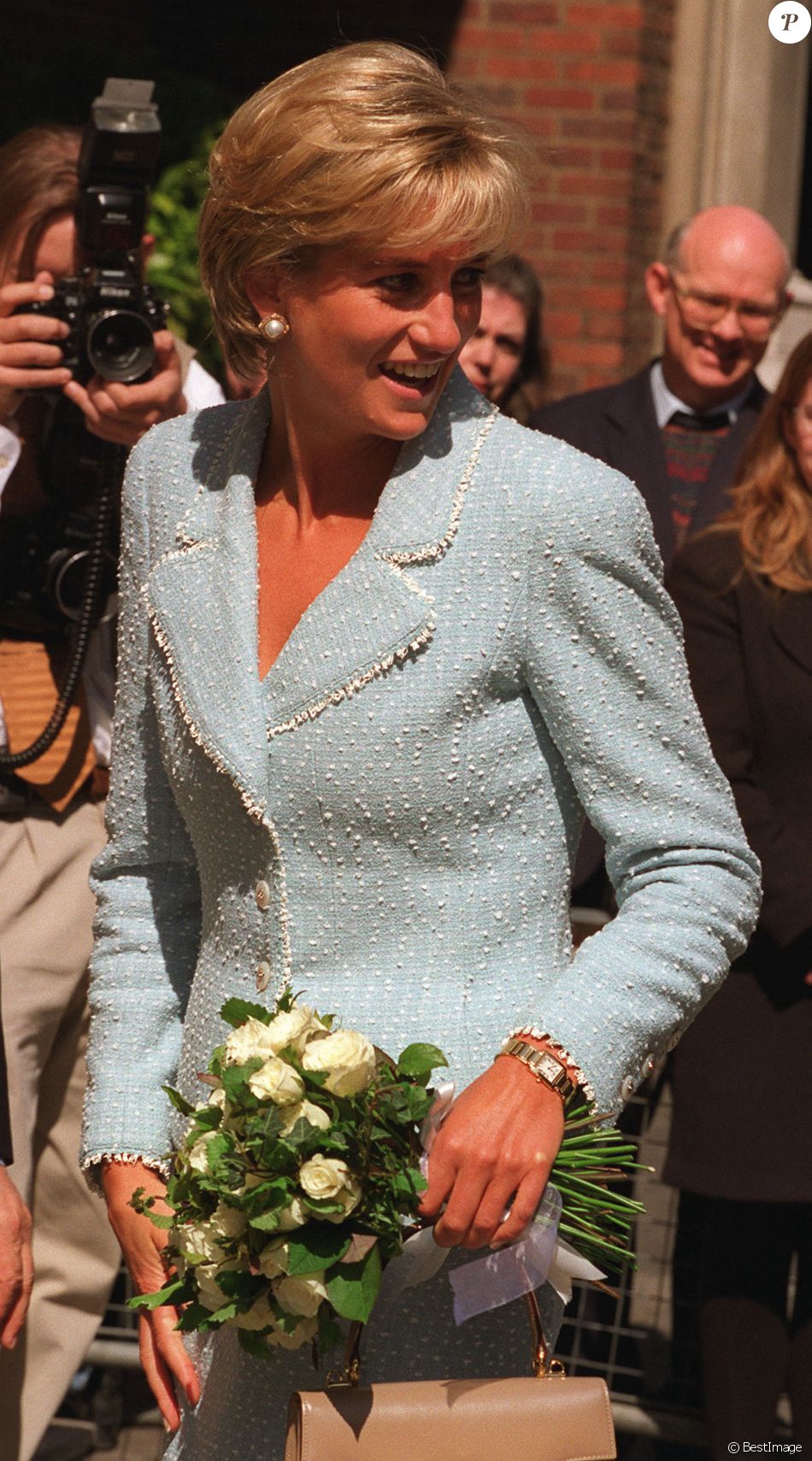 Diana (avec sa montre Cartier) en 1997. - Purepeople