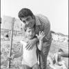 Archives - Enrico Macias et son fils Jean-Claude Ghrenassia - Rendes-vous à la plage en 1972.