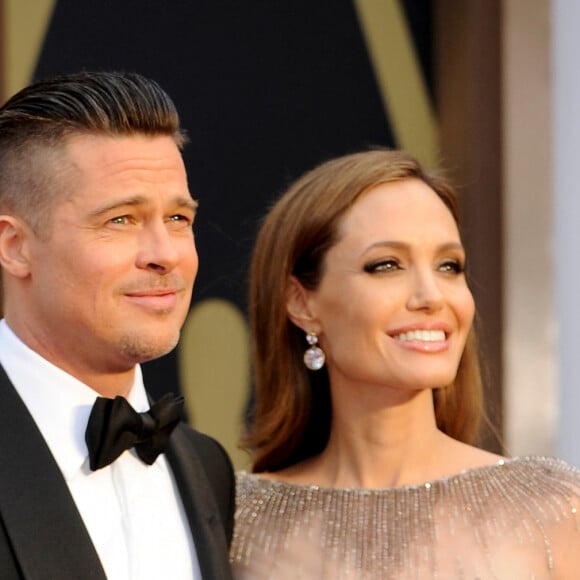 Brad Pitt et Angelina Jolie - Pressroom - 86ème cérémonie des Oscars à Hollywood, le 2 mars 2014.