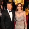 Brad Pitt, Angelina Jolie (habillée en Elie Saab) - 86ème cérémonie des Oscars à Hollywood, le 2 mars 2014.