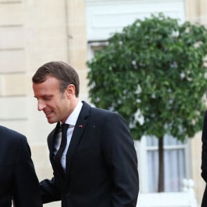 Le président de la République française Emmanuel Macron, sa femme la Première Dame Brigitte Macron et l'ancien Président de la République française François Hollande - Le président de la République française reçoit les chefs d'Etat et de Gouvernement étrangers ayant fait le déplacement en France pour rendre hommage au Président Jacques Chirac au Palais de l'Elysée Paris, France, le 30 septembre 2019. © Cyril Moreau/Bestimage