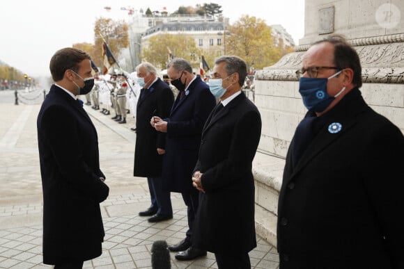Le président Emmanuel Macron, Nicolas Sarkozy, François Hollande - Cérémonie de commémoration de l'armistice du 11 novembre à l'Arc de Triomphe à Paris le 11 novembre 2020. Yoan Valat / Pool / Bestimage