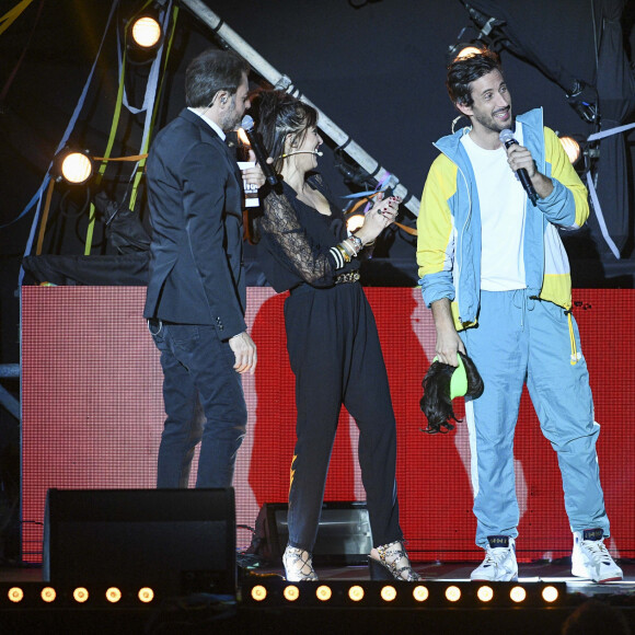 Exclusif - Jérôme Anthony, Erika Moulet et Coach Krees De Almeida - 13ème édition du Concert pour la Tolérance 2019 à Agadir au Maroc, qui sera diffusé le 16 novembre 2019 sur W9. Le 19 octobre 2019 W9 vous donne rendez-vous pour une soirée événement, "La grande soirée de Soprano", enregistré à Agadir au Maroc devant 220 000 personnes pour sa 13ème édition. Pour défendre les valeurs qui leur sont chères telles que le respect, la fraternité et la paix, Soprano a convié ses amis artistes pour un show d'exception ! Tous ont accepté l'invitation de Soprano pour faire de ce concert une grande soirée inoubliable avec des duos inédits ! © Perusseau-Veeren / Bestimage 
