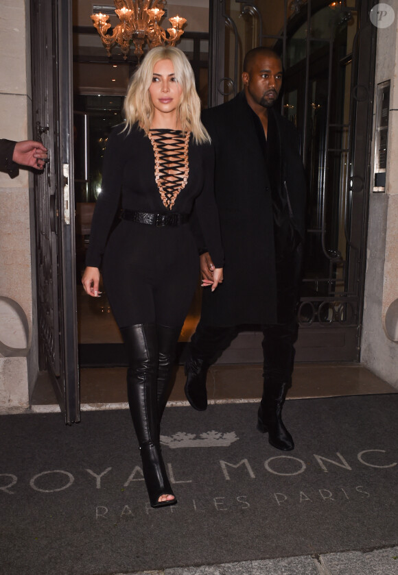 Kanye West et Kim Kardashian quittent leur hôtel pour se rendre au défilé Givenchy à Paris le 8 mars 2015. 