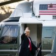 Melania et Donald Trump quittent la Maison Blanche après un mandat de quatre ans, avant d'embarquer en hélicoptère pour la base St-Andrew, le 20 janvier 2021. @Al Drago / Pool via CNP
