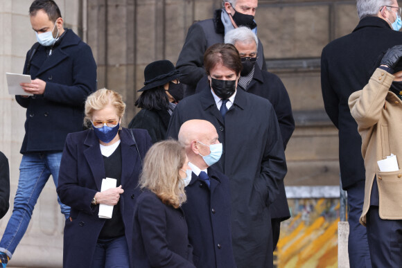 Sylvie Vartan et son mari Tony Scotti - Sorties de la messe anniversaire à la mémoire de Pierre Cardin en l'église de La Madeleine à Paris. Le 29 janvier 2021