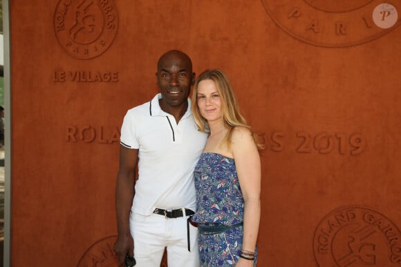 Lucien Jean-Baptiste et sa compagne Aurélie Nollet au village lors des internationaux de tennis de Roland Garros à Paris, France, le 2 juin 2019. © Jacovides-Moreau/Bestimage