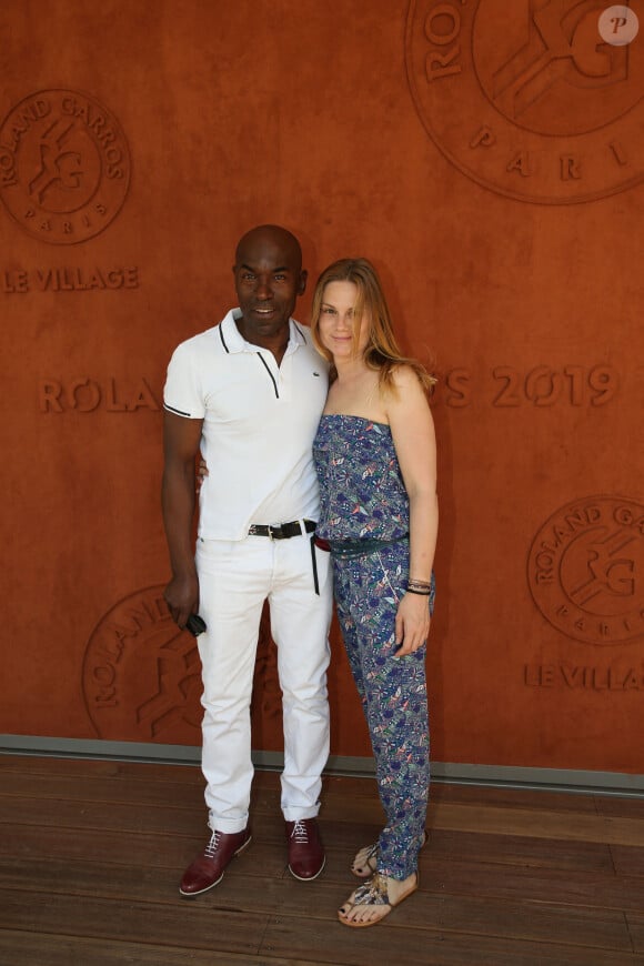 Lucien Jean-Baptiste et sa compagne Aurélie Nollet au village lors des internationaux de tennis de Roland Garros à Paris, France, le 2 juin 2019. © Jacovides-Moreau/Bestimage