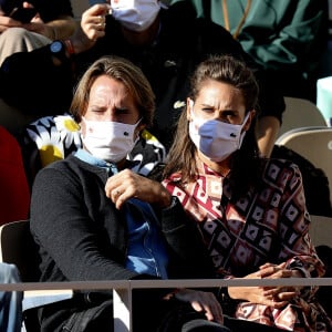 Mathieu Vergne et sa femme Ophélie Meunier dans les tribunes lors des internationaux de tennis Roland Garros à Paris le 9 octobre 2020. © Dominique Jacovides / Bestimage