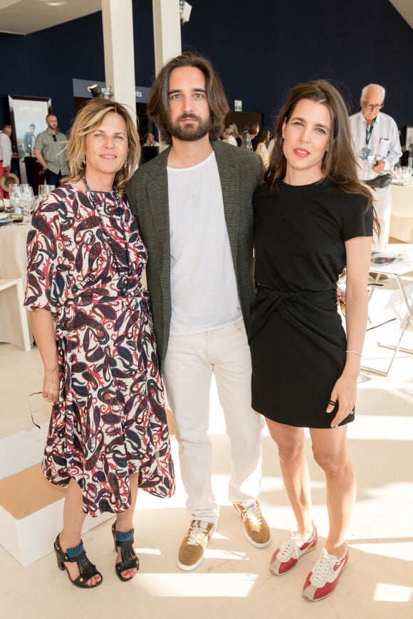 Exclusif - Virginie Coupérie Eiffel (Présidente de Paris Eiffel Jumping), Dimitri Rassam, sa femme Charlotte Casiraghi dans la tente VIP lors du Longines Paris Eiffel Jumping au Champ de Mars à Paris, le samedi 6 juillet 2019. © Luc Castel/Bestimage 