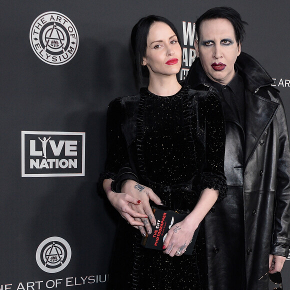 Lindsay Usich et son compagnon Marilyn Manson lors de la 13e édition de la soirée de gala "The Art of Elysiums " dans la salle de spectacle du Hollywood Palladium à Los Angeles. Le 4 janvier 2020.