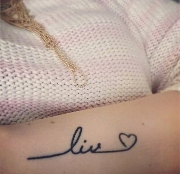 Tatouage de Florence Mezard en l'honneur de sa fille Liv. Le 17 novembre 2014.