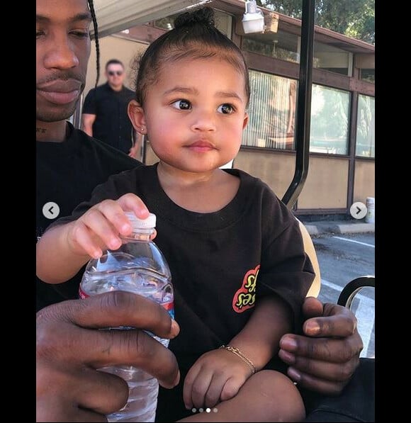 Travis Scott et sa fille Stormi Webster. Juillet 2019.