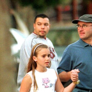Phil Collins et sa fille Lily font du shopping à Beverly Hills. Los Angeles.