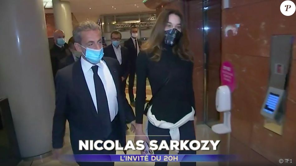 Nicolas Sarkozy accompagné par son épouse Carla Bruni-Sarkozy dans les locaux de TF1 mercredi 3 mars 2021.
