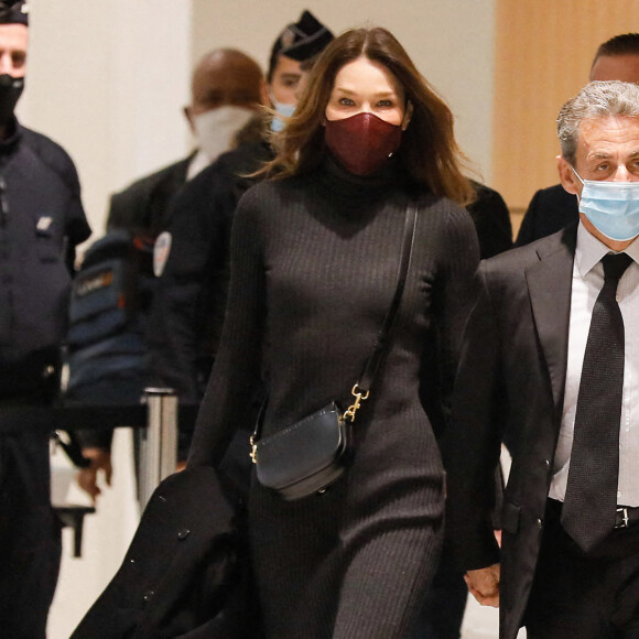 1er jour des plaidoiries de la défense - Nicolas Sarkozy arrive avec sa femme Carla Bruni Sarkozy procès des "écoutes téléphoniques" ( affaire Bismuth) au tribunal de Paris le 9 décembre 2020. © Christophe Clovis / Bestimage 