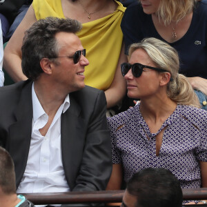 Arthur Sadoun et sa femme Anne-Sophie Lapix - People dans les tribunes des Internationaux de France de Tennis de Roland Garros à Paris. Le 9 juin 2018 © Cyril Moreau / Bestimage