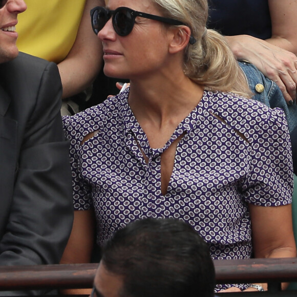 Arthur Sadoun et sa femme Anne-Sophie Lapix - People dans les tribunes des Internationaux de France de Tennis de Roland Garros à Paris. Le 9 juin 2018 © Cyril Moreau / Bestimage