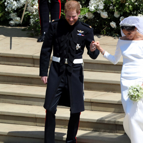 Le prince Harry, duc de Sussex, et Meghan Markle, duchesse de Sussex, à la sortie de chapelle St. George au château de Windsor. Royaume Uni, le 19 mai 2018.