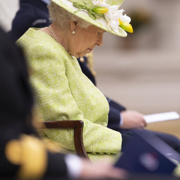 La reine Elizabeth II d'Angleterre assiste à un service pour marquer le centenaire de la Royal Australian Air Force au CWGC Air Forces Memorial à Runnymede, Royaume Uni, le 31 mars 2021.