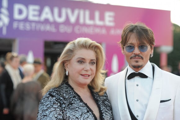 Catherine Deneuve et Johnny Depp à la première du film "Waiting For The Barbarians" lors du 45éme festival du Cinéma Américain de Deauville, France, le 8 septembre 2019. 